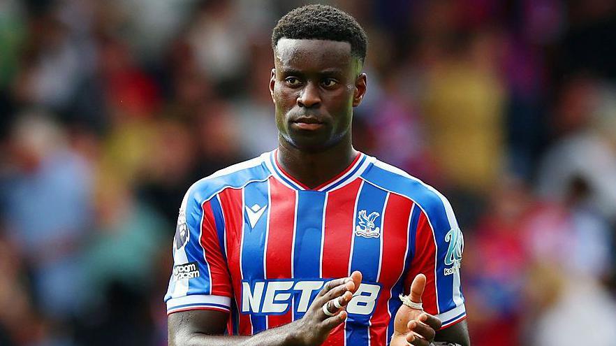 Marc Guehi Liverpool shirt number analyzed as $47M star has 12 options