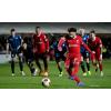 Last-gasp pen maintains Liverpool's perfect start 